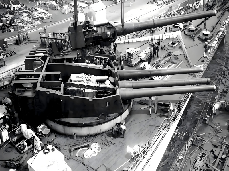 Historic naval artillery turret mechanism showing hydraulic components